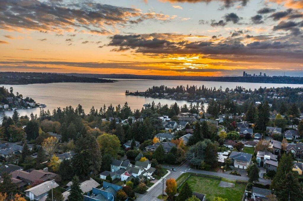 Aerial view of a waterfront residential neighborhood in the Greater Seattle area at sunset