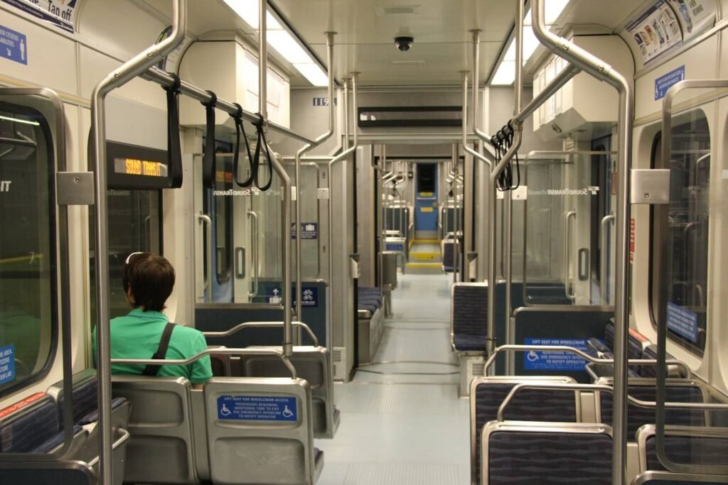 Passenger riding a Link light rail train serving Lynnwood and Seattle